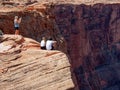 Horseshoe Bend, visitors get too close to the edge of the 1,000 foot deep canyon. Glen Canyon National Recreation Area, Page, Ariz