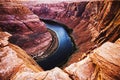 Horseshoe Bend by Grand Canyon at sunset. Summer holiday concept. Horseshoe Bend and Colorado river. Royalty Free Stock Photo