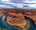 Horseshoe Bend outside of Page, Arizona on a cloudy day Royalty Free Stock Photo