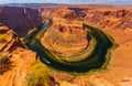 Horseshoe Bend in summer sunny day, formation in Colorado River. Royalty Free Stock Photo