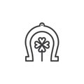 Horseshoe and clover outline icon