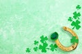 Horseshoe, clover shamrocks and hat for St. Patrick`s Day