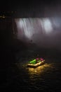 Horseshoe Fall, Niagara Gorge and boat in mist at night, Niagara Falls, Ontario, Canada. High quality photo Royalty Free Stock Photo