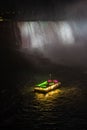 Horseshoe Fall, Niagara Gorge and boat in mist at night, Niagara Falls, Ontario, Canada. High quality photo Royalty Free Stock Photo
