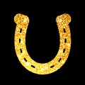 Horseshoe gold glitter on black background. Hoof horse. Symbol luck.