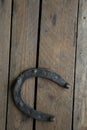 Horseshoe on wooden surface, top view Royalty Free Stock Photo