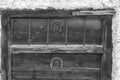 Horseshoes on hut door in the high mountains.