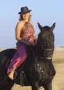 Horsewoman on the beach Royalty Free Stock Photo