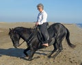 Horsewoman on the beach Royalty Free Stock Photo