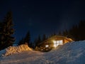 Horska Chata pod Kalovou Holou during winter starry sky Royalty Free Stock Photo
