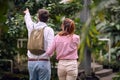 Horticulturists at the Eco Friendly Garden.Man and woman desinger working at urban garden Royalty Free Stock Photo