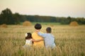 Happy mother and children at summer wheat field Royalty Free Stock Photo