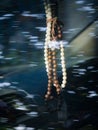 Hory Rosary Hanging on The Rearview Mirror Royalty Free Stock Photo