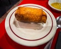 Horzontal view of a classic Cantonese Fried Eggroll on a plate Royalty Free Stock Photo