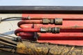 hoses and tubes of the hydraulic system from heavy machinery - Machine to hammer the piles in the construction road junction in M Royalty Free Stock Photo