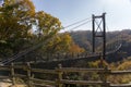 Suspension Bridge surrounded by maple trees in Hoshida Park