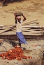 Hoshiarpur Punjab India 03 27 2021A daily wage worker carrying raw material for constructionbricks, sand