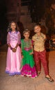 3 kids dressed up for Diwali celebration, Hospet, Karnataka, India