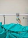Hospital bed remote control in the patient`s hand Royalty Free Stock Photo