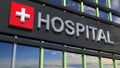 Hospital building sign closeup, with sky