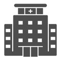 Hospital building solid icon. Medical construction with cross on top glyph style pictogram on white background Royalty Free Stock Photo