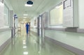 Hospital corridor with blurred figures of the medical staff