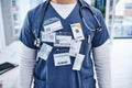 Hospital, doctor and man with name tag, healthcare and promotion with progress, surgeon and nurse. Zoom, person and Royalty Free Stock Photo