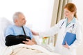 Hospital - female doctor examine senior patient