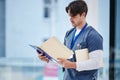 Hospital folder, doctor and man reading documents, healthcare records or clinic information. Wellness services, medical Royalty Free Stock Photo