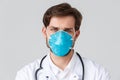 Hospital, healthcare workers, covid-19 treatment concept. Tired doctor working night shift fighting coronavirus Royalty Free Stock Photo