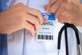 Hospital ID, doctor hands and clinic access pass of general health practitioner with stethoscope. Icu card, nurse and Royalty Free Stock Photo