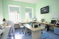 At a hospital laboratory. Lab technician performing analysis of blood samples with gas-electrolyte analyzer