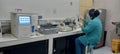 Hospital laboratory staff are checking a patient's blood