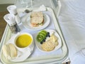 Hospital meal, breakfast including fruits and crackers, pumpkin soup and sandwich . Royalty Free Stock Photo