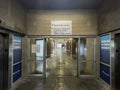 A hospital parking deck urban spooky elevator doors open and sign