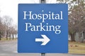 Hospital Parking Sign With Arrow Blue In Color