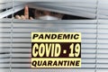 Hospital quarantine or isolation of patient standing alone in room with hopeful for treatment of Coronavirus COVID-19