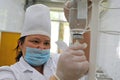 Almaty / Kazakhstan - 05.15.2012 : The nurse puts a drip on the patient. Medical solution - plasma replacement agent