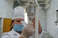 Almaty / Kazakhstan - 05.15.2012 : The nurse puts a drip on the patient. Medical solution - plasma replacement agent