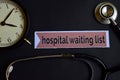 Hospital waiting list on the print paper with Healthcare Concept Inspiration. alarm clock, Black stethoscope.