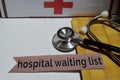 Hospital waiting list on the print paper with medical and Healthcare Concept