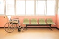 Hospital waiting room with wheelchair and  chairs Royalty Free Stock Photo