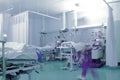 Hospital ward with blurred figure of medical worker Royalty Free Stock Photo