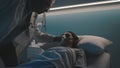Hospitalized patient lying in a bed