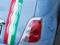 Fiat 500 blue neo retro car with flag italian sticker on rear Royalty Free Stock Photo