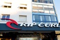 Rip curl logo brand and sign text front of facade surf fun store of surfboard fashion