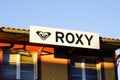 Roxy logo sign of surf brand text shop for girls women of Quiksilver group