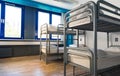 Hostel interior, bunk beds and linen, nobody