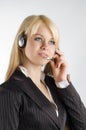 Hostess with earphone Royalty Free Stock Photo