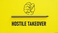 Hostile takeover is shown using the text and picture of the fist
